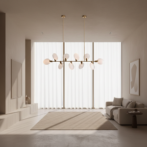 Modern chandelier with multiple round lights on a gray background