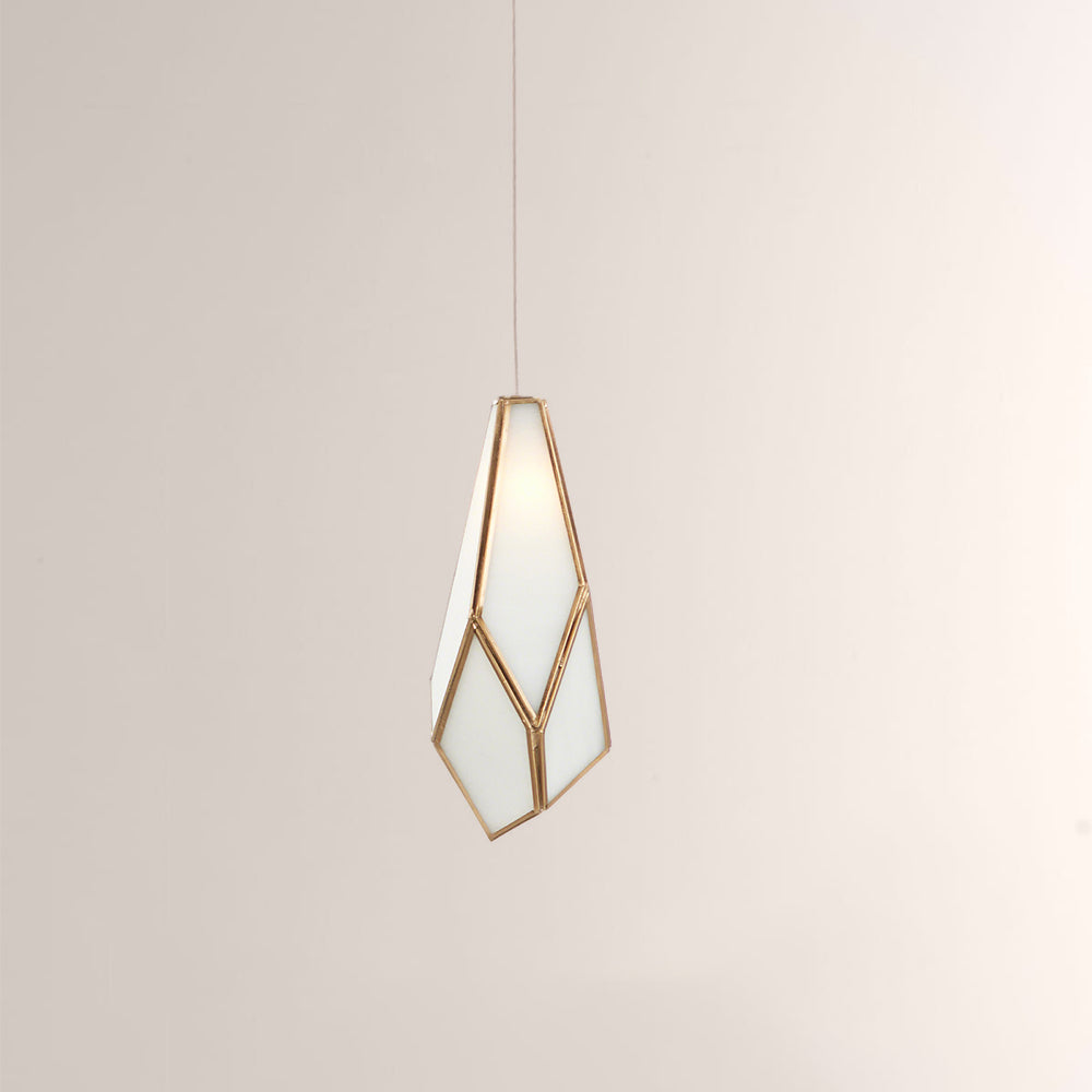 Modern pendant light with geometric design on a neutral background