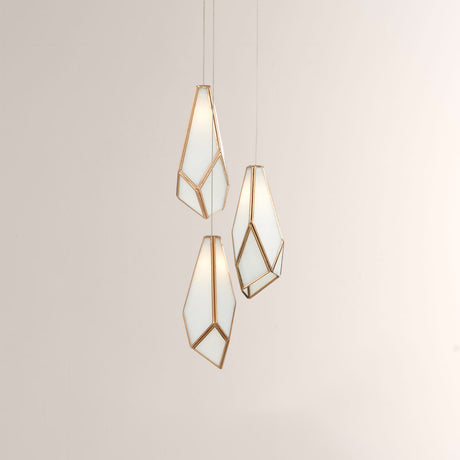 Geometric pendant lights on a neutral background